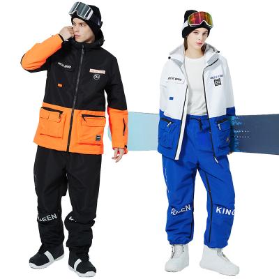 China Men and Women Ski Overalls Winter Warm Waterproof Breathable Snowboard Jackets Bibs Pants Outdoor Unisex Snowsuit Bibs for sale