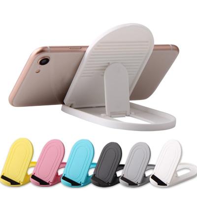 China 1Pc Portable Multi-Function Adjustable Plastic Holder Shelf Cell Phone Bracket Storage Holders Folding Stored Universal Tools for sale