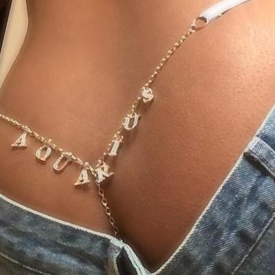 China Custom Hot Sexy Crystal 12 Zodiac Sexy Zodiac Body Jewelry Beach Bling Name Pendants Thong Body Chain For Women for sale