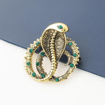 China 2021 fashion cute popular brooch cobra diamond alloy girl fashion pin brooch clothing accessories for sale