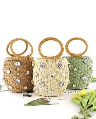 China Lady Summer Handmade Bags for Women Beach Bucket Shaped Weaving Top Handle Handbags Ladies Straw Bag Wrapped Beach Bag for sale