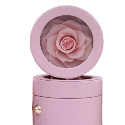 China Handmade Floral Stocked Round Gift Box Cylinder Flower Box PU Leather With Preserved Roses for sale