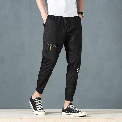 China new Anti-wrinkle men's pants men's casual personality men's quilting pants motion pants pencil pants casual elastic waist for sale