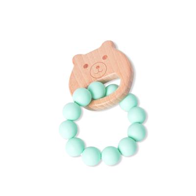 China Hot Selling Baby Teether Chewable Ring Baby Rattle Teether Wooden Silicone Teether 100%food grade silicone pearl Teether for sale