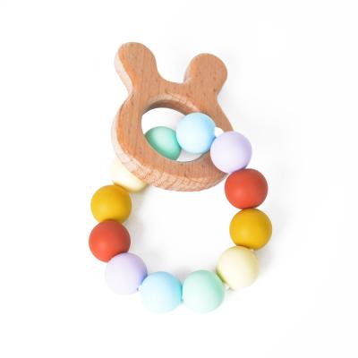 China Hot Selling Organic 100%food Grade Silicone Teether Wooden Teether Toy Baby Teething Toys Beech Teeth Ring for sale