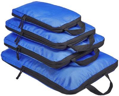 China Durable Travel Packing Cubes Squeeze Packing Cubes, 4 Set Travel Luggage Packing Organizers, Expanding Storage Packing Cubes for sale