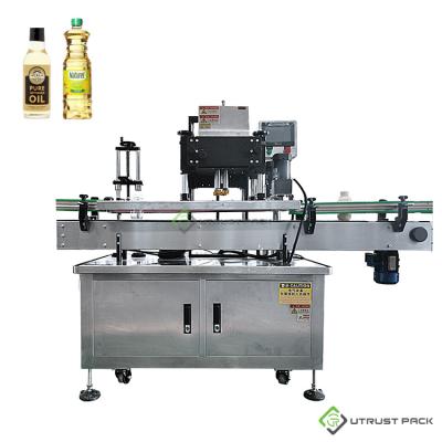 China Food Soybean Oil Machine Cap Sealing Machine Filling Capping Plastic Bottle for sale