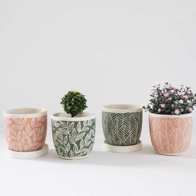 China Nordic minimalist modern concrete pot mold plant decor creative garden style leaf printed cement garden pots for sale