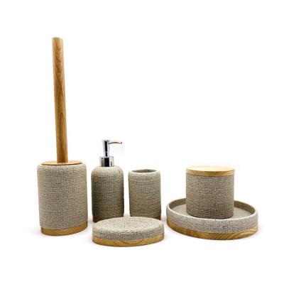 China Sand color polyresin bathroom accessories set wooden base bathroom countertop accessories soap dispenser for sale