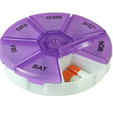 China Round Pill Storage Food Grade 7 Compartment Portable Pill Box Weekly Pill Box for sale