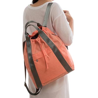 China New Design Waterproof 300D Polyester Travel Handbag And Backpack Two In One for sale