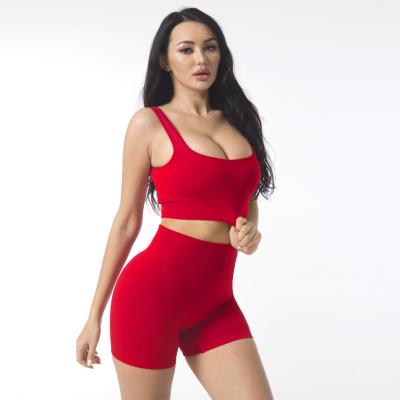 China Wholesale Breathable Sexy Rib Seamless Yoga Fitness Set Women Ladies Crop Top Bra Summer Yoga Shorts Set for sale