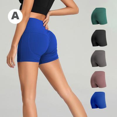 China Dropshipping Breathable Yoga Shorts With Pockets Biker Shorts High Waisted Workout For Women Running Shorts for sale