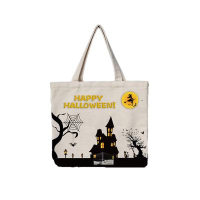 China Halloween Decorations 2022 New Style Portable Funny Cotton Canvas Halloween Pumpkin Custom Gift Bags For Candy for sale