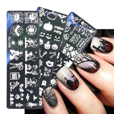 China Durable Nail Art Stamping Plates Skull Pumpkin Ghost Christmas Halloween Shape Design Nail Stamp for sale