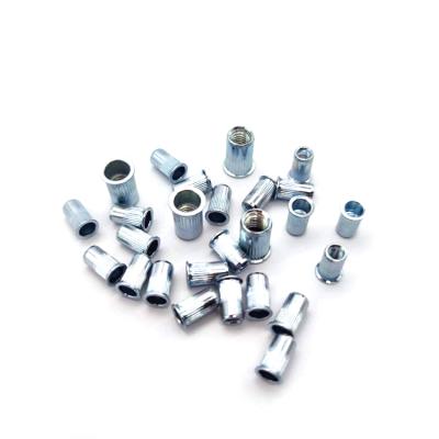 China Wholesale heavy industry flat head rivet nut furniture hardware stainless steel metal riveting nut for sale