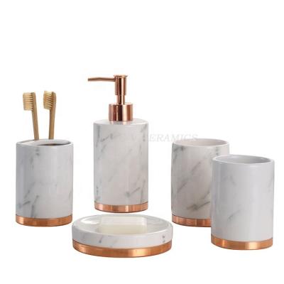 China Viable Modern Nordic Hotel Rose Gold Metal Base Ceramic Bathroom Accessories Whit Marble Effect for sale