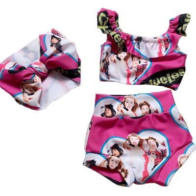 China Cute and Fresh Wholesale Anti-UV Children's Three-piece Swimsuit with Bandage Swimsuit for sale