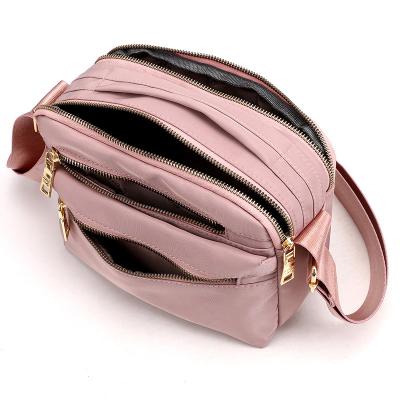 China Latest Design Fashion Messenger Strap Nylon Shoulder Bag Ladies Reusable Unique Stylish Cross Body Bag for sale