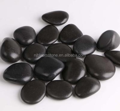 China Natural stone black river pebbles for sale