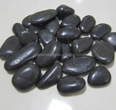 China Garden decoration polished black natural stone rocks for decoration for sale