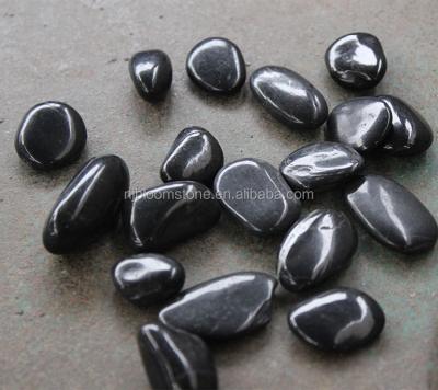 China Landscaping large black river rock stones for sale