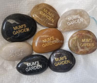 China Modern Engraved Natural Black Letter Pebbles River Stones for sale