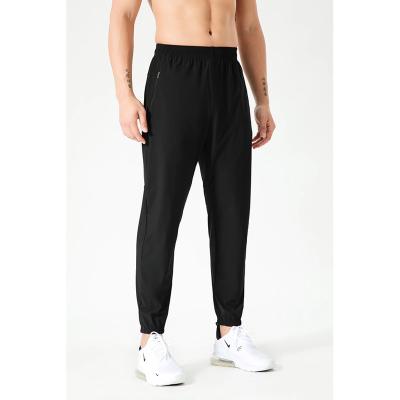 China Anti-wrinkle fashion running sports boys outdoor men's pants and trousers for sale