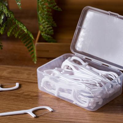 China Disposable 50 Pcs Box Portable Disposable Plastic Dental Floss for sale