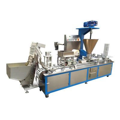 China Goods Easy To Operate Automatic Play Dough Cup Packaging Machine for sale