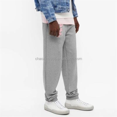 China Anti-Wrinkle Two Side Pockets Custom OEM Logo 100%cotton Workout Print Sport Sweatpants For Men for sale