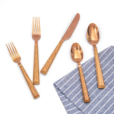 China Viable fancy rose gold pvd flatware 24 piece metal coating bulk custom industrial cutlery with color plastic wood handle for sale