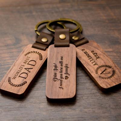 China Custom Logo Engraved Named Promotional Souvenir Mute Promotion Gift Craft The Fingerboard House Key Ring Wood Keychain Surfboard Wooden Laser Chain Bag for sale