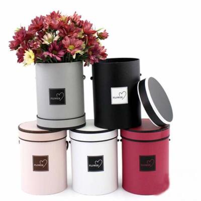 China Disposable Professional Custom Printed Hardcover Cardboard Round Flower Box for sale