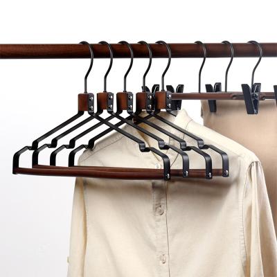 China High Quality Nordic Wooden Clothing Hangers New Arrival Iron White Black Coat Hanger Pants Skirt Hangers for sale