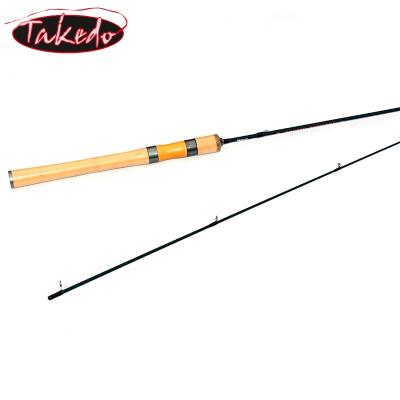 China TAKEDO 602XUL High Density Carbon Fishing Rod Sea Telescopic Bass Rod Spinning Casting Rod With Wooden Spool Seat for sale