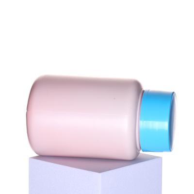 China Pink 85ml Cosmetic Custom Colored Nail Remover PET Plastic Bottle With Black Sponge And Blue Cap for sale