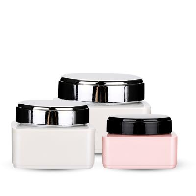 China 15g 30g 50g Nail Glue Square Plastic Pink Empty Glass Cosmetic Bottles Cosmetic Facial Cream Jars for sale