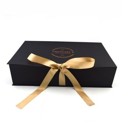 China Black Custom Magnetic Premium Luxury Recyclable Cardboard Paper Packaging Clothing Box Flip Top Gift Boxes With Ribbon zu verkaufen