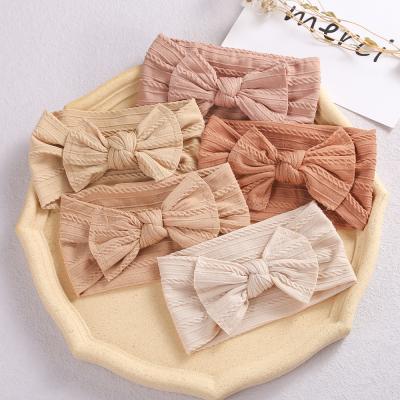 China Baby Eco-Friendly Wholesale Soft Nylon Headband Jacquard Bow Double Layer Elastic Headband For Hair Accessories Girl for sale