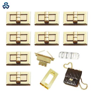 China Custom Logo Color Custom Closures Bag Metal Push And Turn Bag Purse Lock Twist Locks Custom Design Press Handbag Lock Hardware For Bags for sale