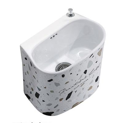 China Modern Oval Ceramic Anti Block Mop Sink Floor Mounted Decoration Pattern Balcony Mop Pool Rapid Sewage Disposal Bathroom Mop Tub for sale