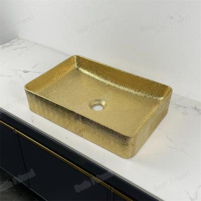 China Modern Sanitary wares ceramic rectangular sink gold electroplate countertop bathroom ceramic art hand wash basin for sale