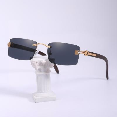 China Fashion Sunglasses 2023  Men New Wood Grain Color Buffalo Horn Shape Fashion Small Square Sun Shades Glasses Trendy Rimless Sunglasses 2023 for sale