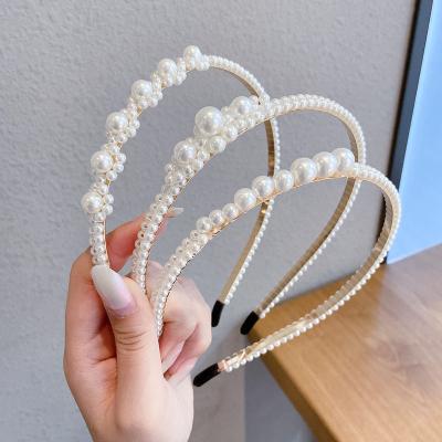 China Decorate Competitive Price Women Wholesale Hair Band White Headbands With Big Beads for sale