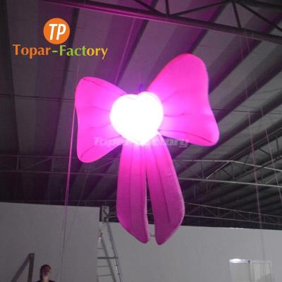 China Customized Topar-Inflatable Environmental Protection Inflatable Bowknot Hanging Inflatable Arch For Christmas Decoration for sale