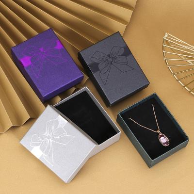 China Bow Luxury Gift Surprise Jewelry Package Box 7*9 Ring Necklace Earring Jewelry Box Packaging Paper Box for sale