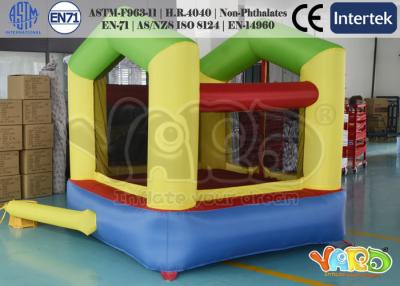 China Backyard Nylon Oxford Inflatable Bounce House Orange With Dual Slide for sale