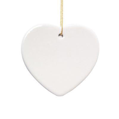 China Customization Ornaments White Heart Shaped Uncoated Ceramic Pendant Outdoor Factory Christmas Tree Ornaments Direct Group Of Ornaments for sale