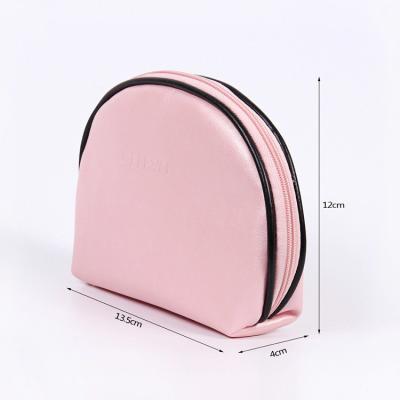 China Custom Large Capacity PU Material Printed Cosmetic Bag for sale